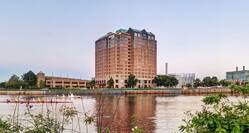Hotel Exterior at daytime with view of river