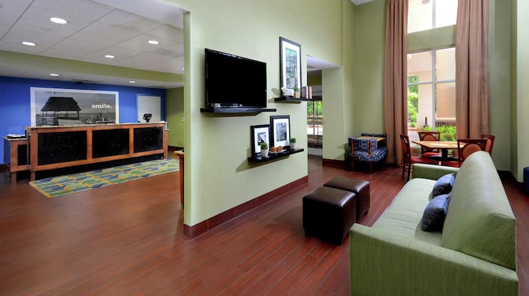 Lobby area with TV and comfortable seating