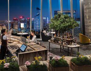Bar area with seating and view of city