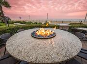 Outdoor Firepit with seating and beach view
